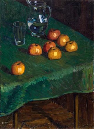 Apples on a green cloth