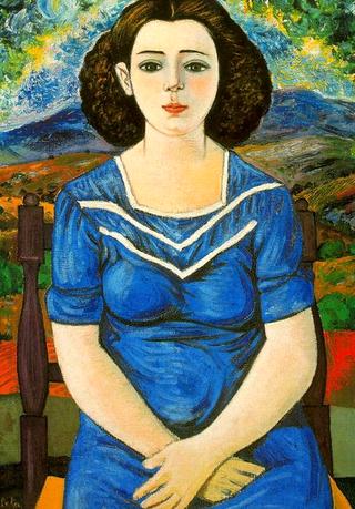 Portrait of a seated brunette