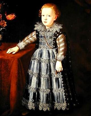 Portrait of a Child Standing by a Table
