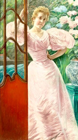 Portrait of a young woman in a conservatory