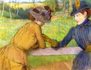 Two Women Leaning on a Fence