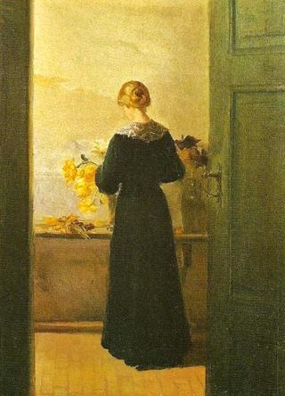 A Young Girl Arranging Flowers