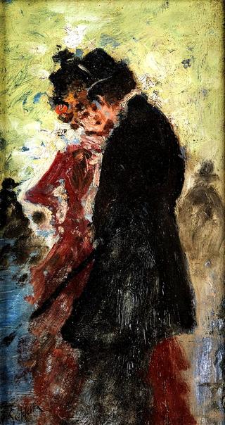 Young gentleman with lady in red