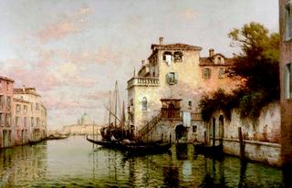 Venetian canal with Santa Maria della Salute in the distance