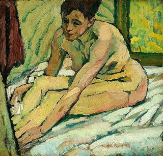 Woman sitting in front of the window