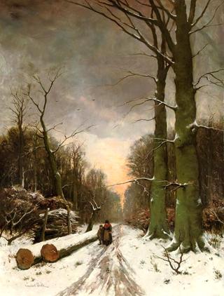 A Snow Covered Forest at Sunset