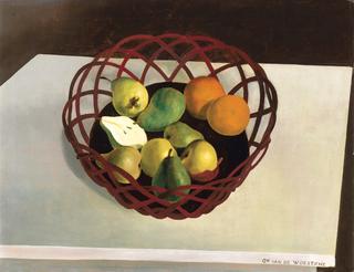 Panier de fruits avec poire coupée