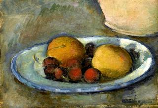 Apricots and cherries on a plate