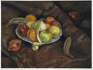 Still life with fruit on blue and white plate