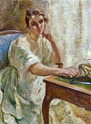 Jeune femme à la table