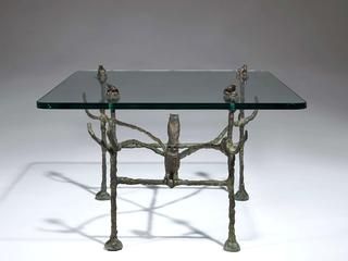 A Trapezoidal coffee table, model the "owls and frogs"