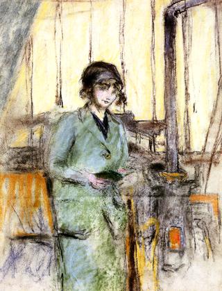 Girl in Green Standing in the Studio