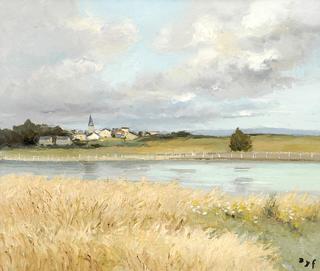 River landscape with a village in the distance