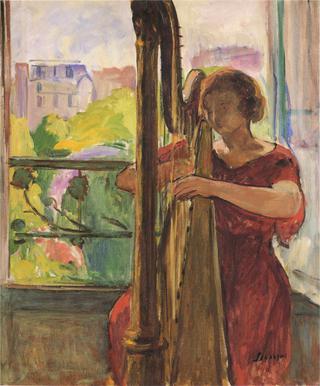 A girl playing a harp