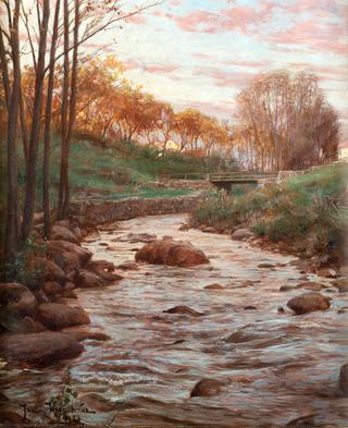 Autumn landscape with bridge over stream