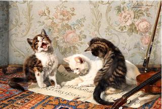 Three Kittens on a Sheet of Music