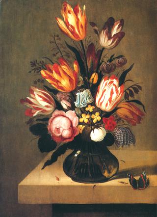 Bouquet of flowers with a butterfly on a stone slab