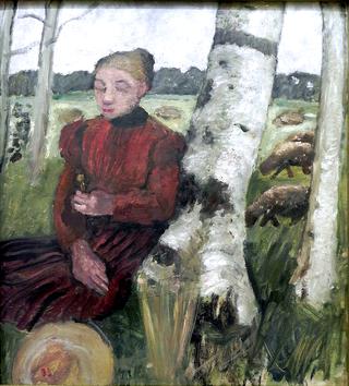 Girl resting on birch trunk