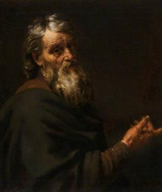 A Bearded Old Man Gesturing with his Right Hand
