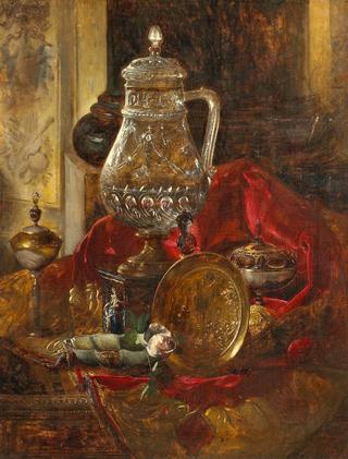 A still life with a crystal tankard and other precious objects arranged on a draped cloth