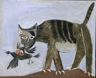 Chat saisissant un oiseau