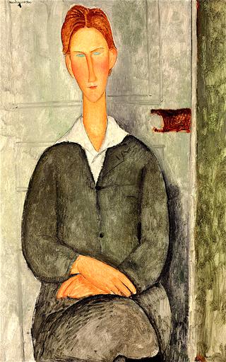 Young Red Haired Man Sitting