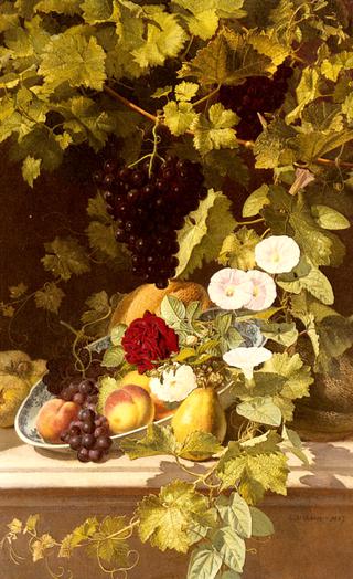 A Still Life With Fruit Flowers And A Vine