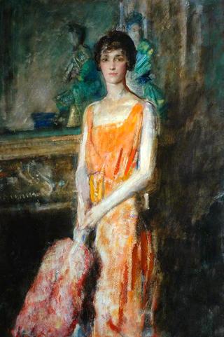 Woman in Orange Dress by the Mirror