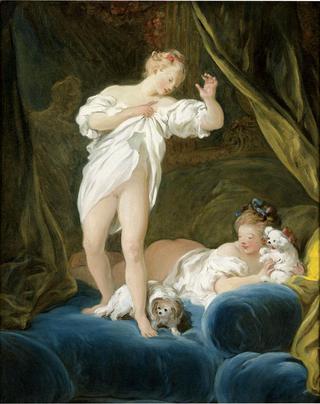 Two Girls on a Bed Playing with their Dogs