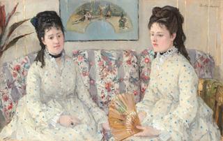 Two Sisters on a Couch