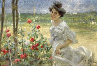 Young woman in a rose garden