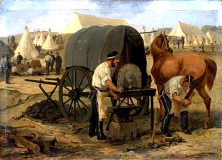第17团龙骑兵的骑兵在乔巴姆营地的一个移动锻造场里给马穿鞋