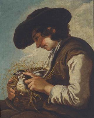 A young boy with a bird