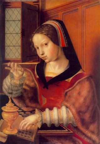 Woman weighing Gold