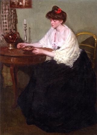Woman Sitting at a Table