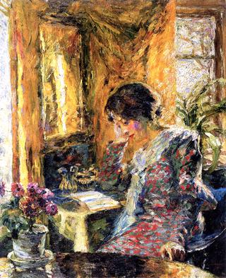 Woman reading in a room with a mirror