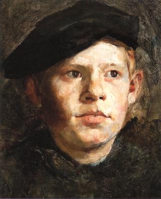 Young Boy Wearing a Cap
