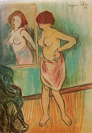 Woman Looking at Herself in the Mirror