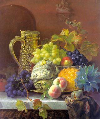 Fruits on a tray with a silver flagon on a marble ledge