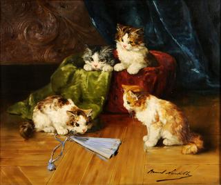 chatons jouant avec un eventail