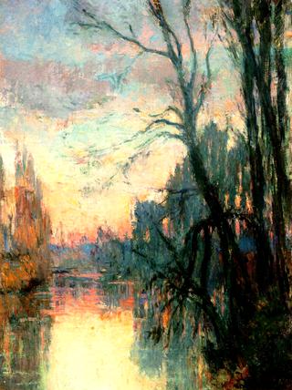 View of a River with Trees at Sunset