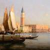 威尼斯圣马可钟楼前停泊在码头的吊舱和小船