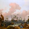 A Coastal Landscape with Many Figures on the Shore by a quay, with Several Two-Deckers in a Still Breeze beyond